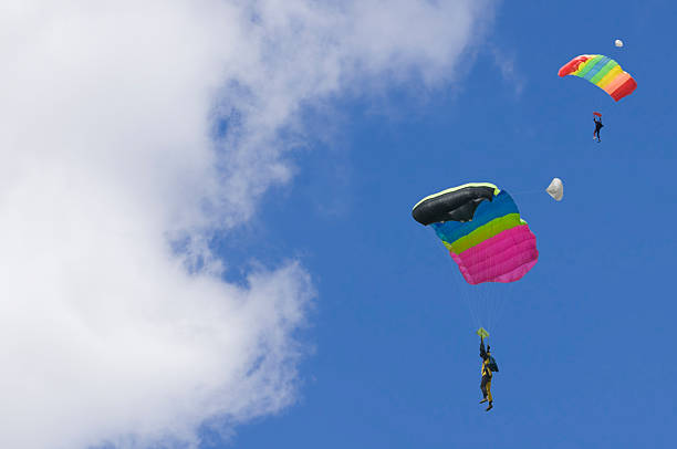 istock Skydivers - two parachutists and a blue sky 181098020