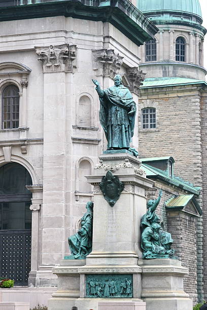 Marie-Reine-du-Monde Cathedral statues in front of CathAdrale Marie-Reine-du-Monde downtown montreal mary queen of the world cathedral stock pictures, royalty-free photos & images