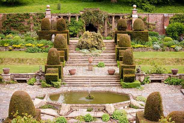 istock Pond with topiary garden and grotto 181098465