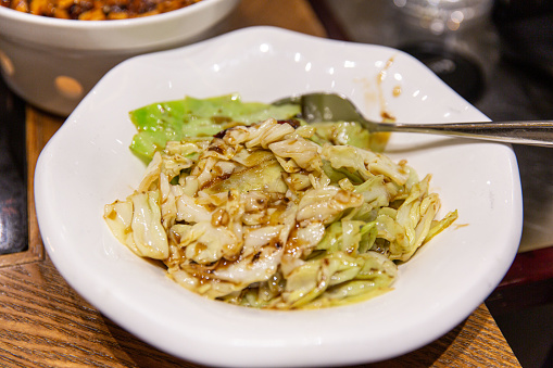 Sweet and Tangy Cabbage Delight, Authentic Chinese Sweet and Sour Cabbage Dish Perfectly Prepared for Restaurant Dining