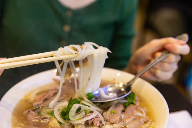 istock Traditional Beef Combination Pho Rice Noodle with Beef Innards, Onion, and Coriander 1810989528