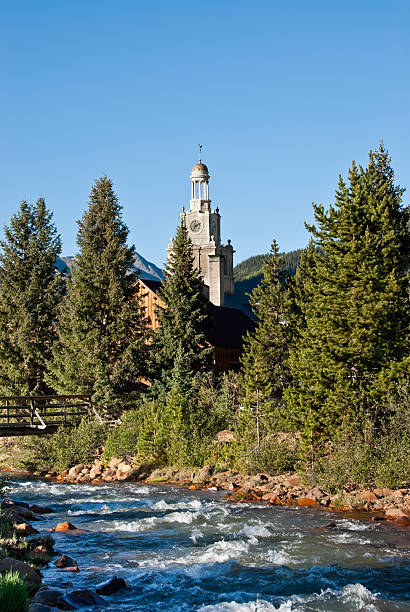 Cement Creek and San Juan County Courthouse The historic San Juan County Courthouse was built in 1908. The courthouse is located in Silverton, Colorado, USA. jeff goulden government building stock pictures, royalty-free photos & images