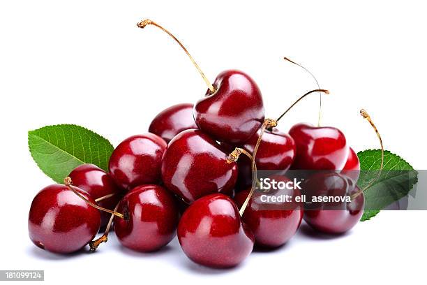 A Pile Of Cherries With Leaves Attached Stock Photo - Download Image Now - Cherry, White Background, Cut Out