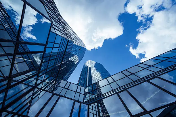 Clouds reflected in modern office buildings, Frankfurt, Germany