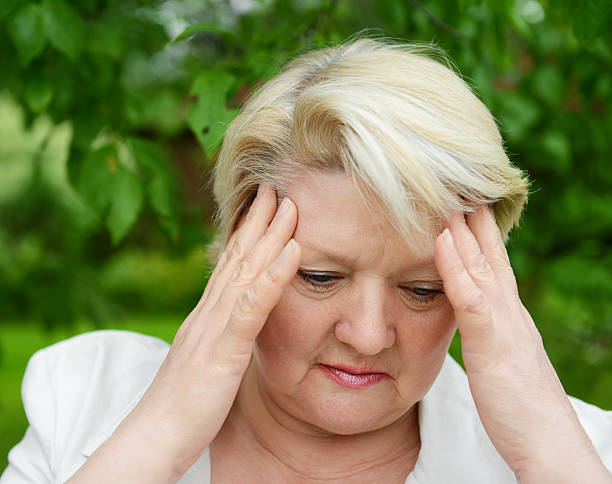 istock mature woman in nature 181100609