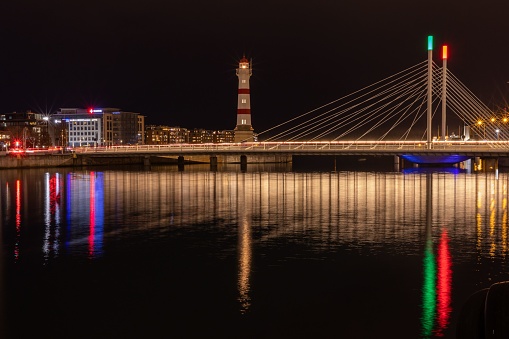 Malmo, Sweden – November 14, 2021: The stunning night skyline of Malmo, Sweden, illuminated by a myriad of golden lights