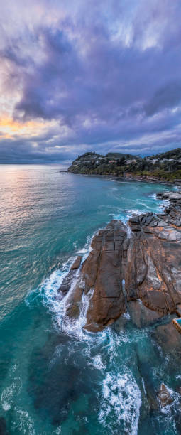 istock Northern Beaches Sunrise at the seaside with rain clouds 1811017925