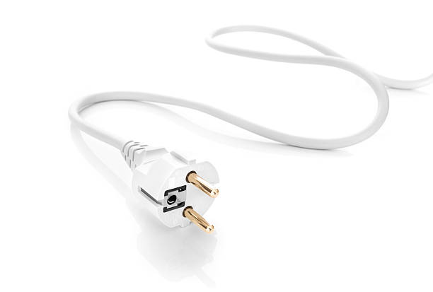 электрическая вилка на белом фоне - electric plug outlet network connection plug electricity стоковые фото и изображения