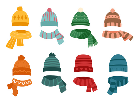 Set of hats and scarves isolated on white.