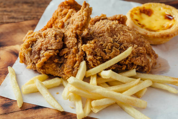 istock junk food on wooden background 1811031214