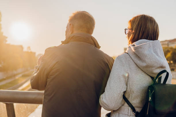 istock A senior couple enjoying by the river at sunset 1811044985