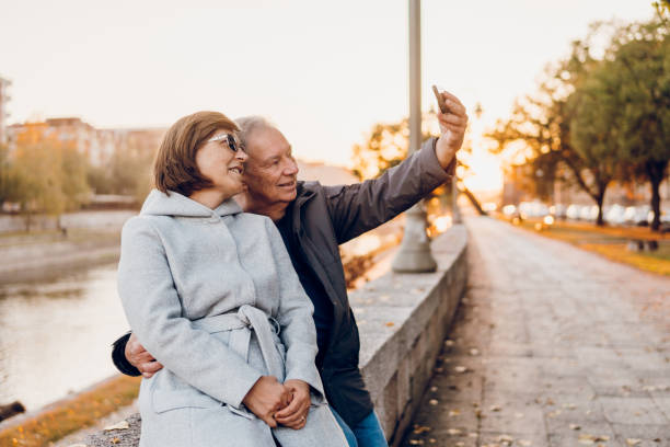 istock A senior couple enjoying by the river in autumn 1811049231