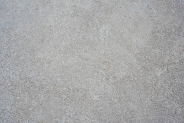 Concrete wall light gray background. grunge stone texture with scratches