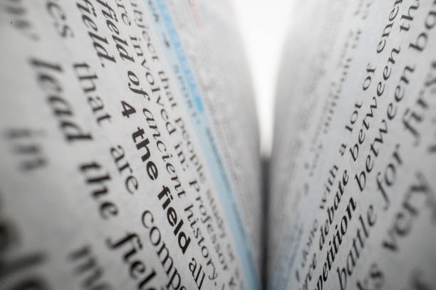 Close up of a book sheet full of defocused text