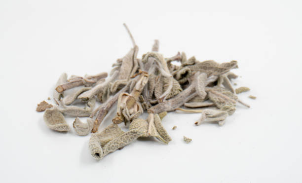 istock Dry green tea leaf macro isolated on white background. 1811103378