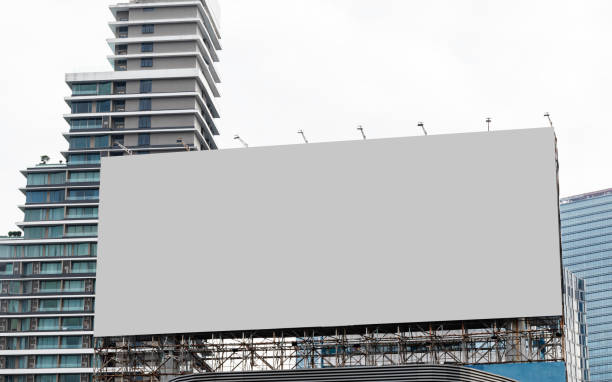 istock Mock up billboard on rooftop building .clipping path for mockup 1811138628