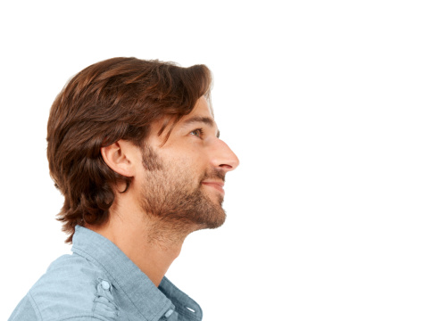 Side profile of a good-looking male staring off into the distance - Copyspace