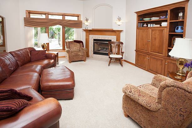 istock Spacious Earth-Tone Living Room Showcase Home Interior 181116203