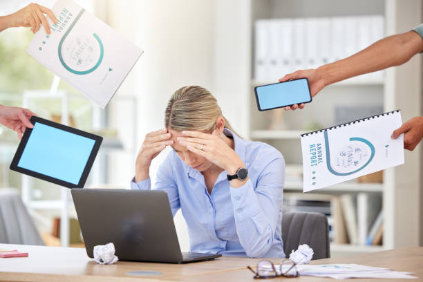 istock Stress, demand and woman worker with hands holding business reports and blank technology screens. Anxiety, overwhelmed and tired person unhappy with corporate career pressure and deadline. 1811163100