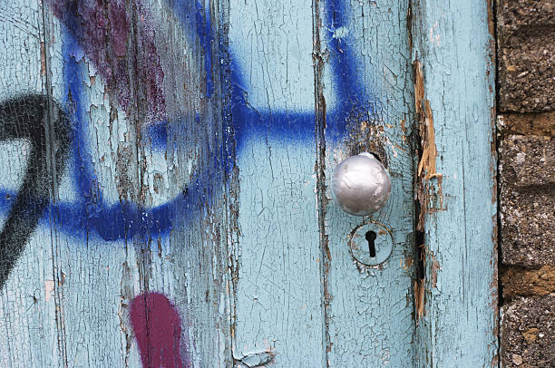 The old green door of the elementary school classroom opened.