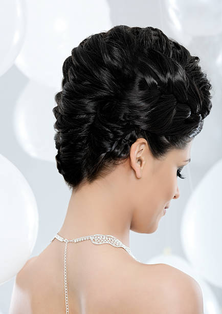 istock hairstyle-braided hairbun 181117740