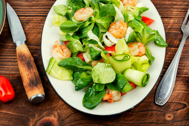 istock Vegetable salad with shrimp, seafood salad. 1811177665