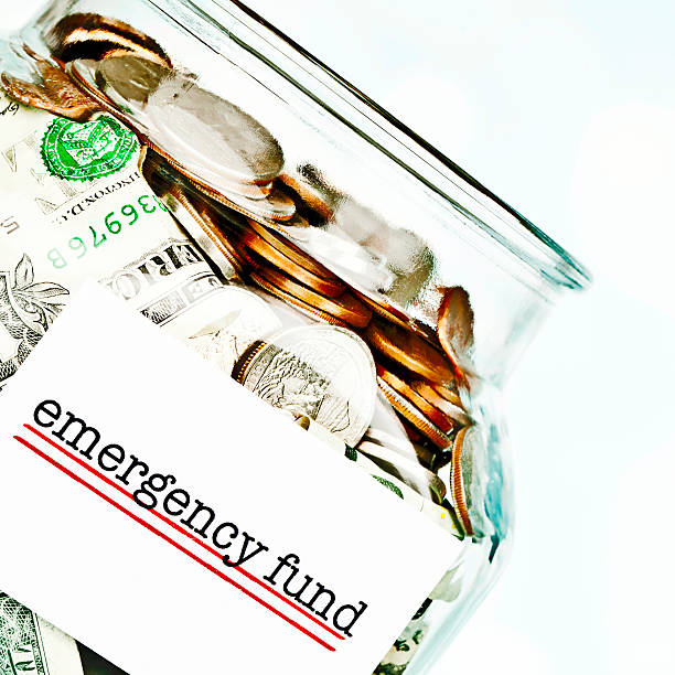 istock Emergency Fund Jar Filled with American Money 181119103