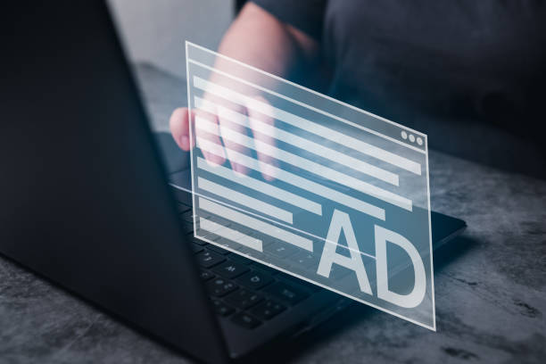 istock Woman use laptop with a pop up AD as virtual interface. 1811203271