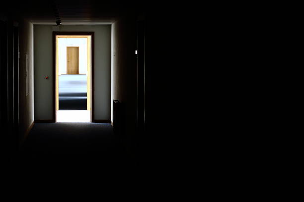 istock Light at the end of a corridor 181120718