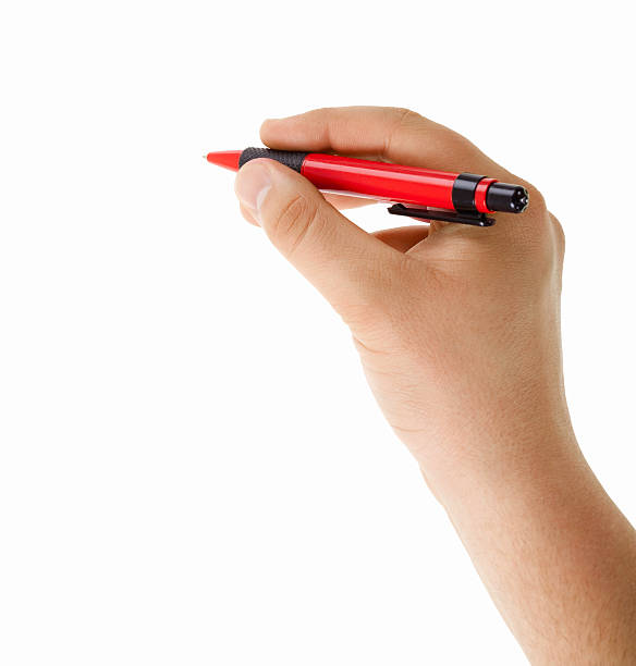 istock Hand with red ballpoint pen writing isolated 181121127