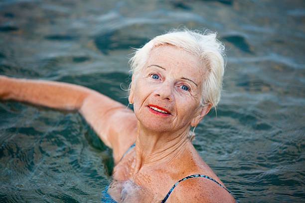 istock Senior Swimmer In The Sea 181121579