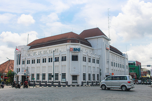 Yogyakarta, Indonesia - Nov 16, 2023: An iconic BNI Bank, the building has been established since Dutch Colonialism from 0 Kilometer of Yogyakarta city. With blue sky in the background.
