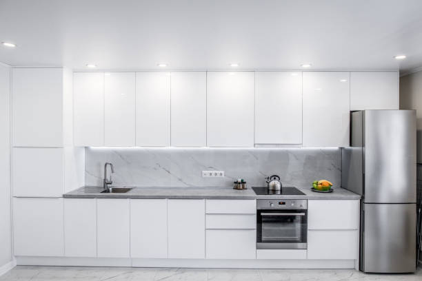 istock modern white kitchen with many cabinets and appliances 1811242683