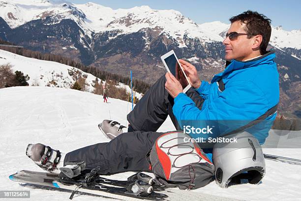 Technology On The Slopes Stock Photo - Download Image Now - Businessman, Skiing, Corporate Business