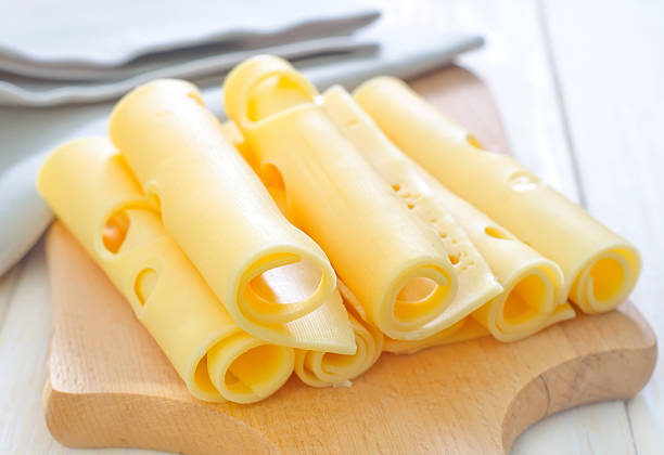 formaggio - swiss cheese foto e immagini stock