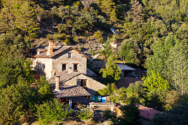 This finca is located in the Pyrenean foothills in the Alt Urgell region in the province of Lerida in Catalonia, Spain. It is far away from civilization so that electricity needs to be supplied by solar panels.