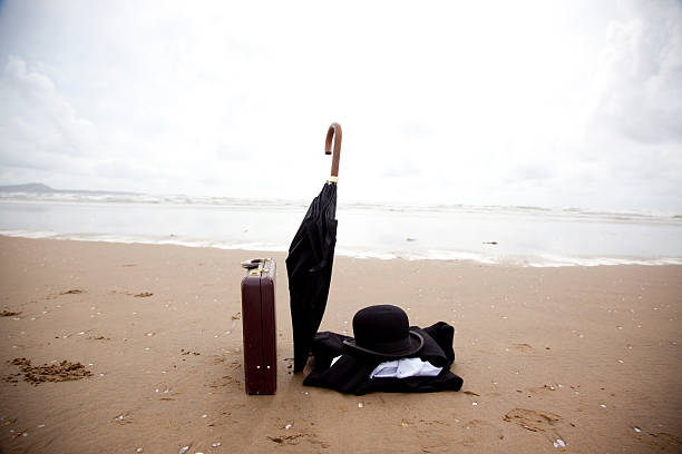 business attire abandoned on beach