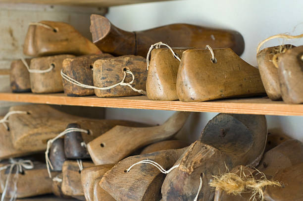 Old Lasts Closeup of wooden shape models (Last) for making shoes shoe mold stock pictures, royalty-free photos & images