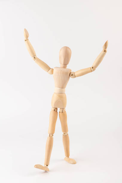 istock Wooden Mannequin, hopping, playing, without base, plain background, gesture, pose 1811293400