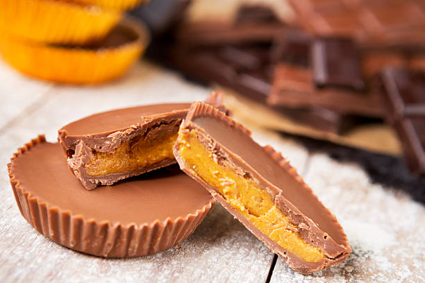 homemade peanut butter cups on a rustic table - peanutbutter bildbanksfoton och bilder