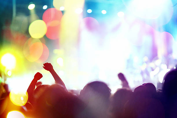 istock People at concert party. 181130502