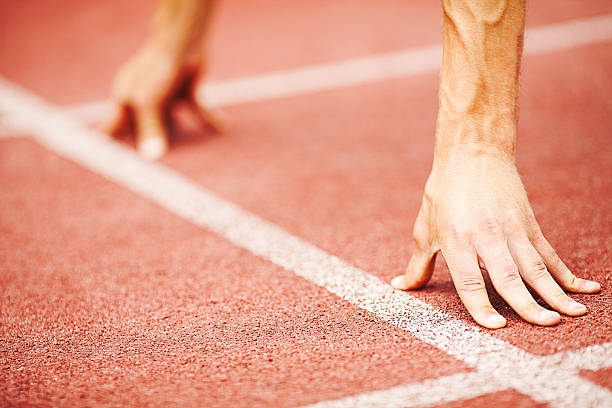 istock An athletes hands on the get set position 181132163