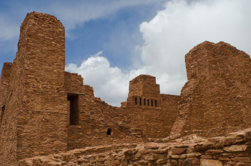 The mission church of La Purisima Concepcion in the Quarai ruins lies empty in central New Mexico.  Quarai is one of three distinctive parts of the Salinas Pueblo Missions National Monument and was once home to a thriving community.  Prior to the arrival of Don Juan de Onate in 1598, the area was the location of a large pueblo village.  Thereafter, with successive Spaniards bringing their faith to the area, Quarai remained inhabited until 1678, when disease, drought and Apache raids led to its abandonment.