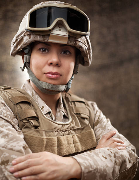istock US Marine Female Soldier in Combat Gear 181132866