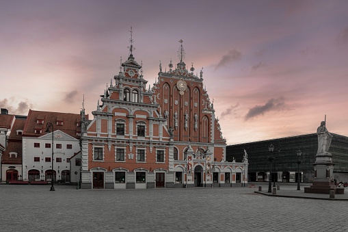 A beautiful purple sunset sky over the old town square of Riga, Latvia