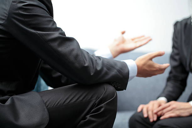 Business Conversation Hands of a businesswoman and businessman in meeting. Begging stock pictures, royalty-free photos & images