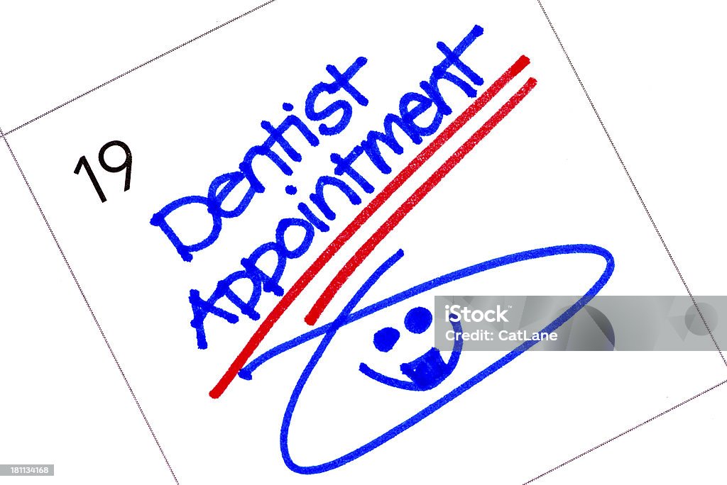 Dentist Appointment Reminder on Calendar Anthropomorphic Smiley Face Stock Photo