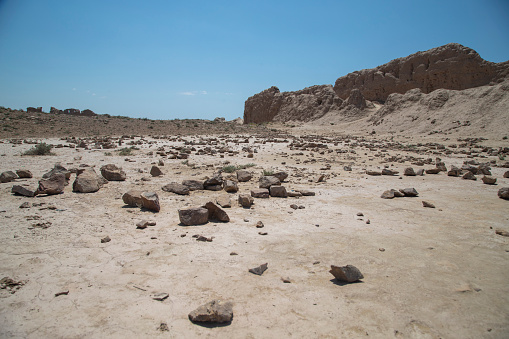dry stones and cracked lands of desert