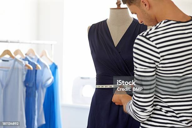 Young Male Designer Taking Measures On A Mannequin Stock Photo - Download Image Now - 20-29 Years, Adult, Adults Only