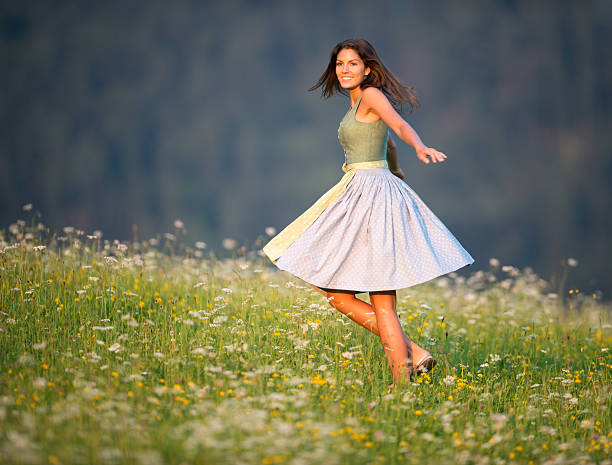Woman in field enjoying the nature